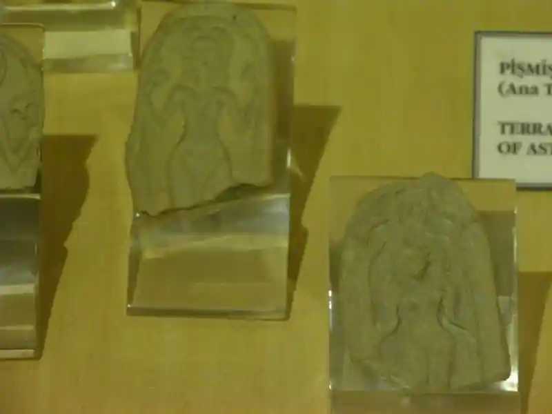 Female figure carved on a terracotta clay